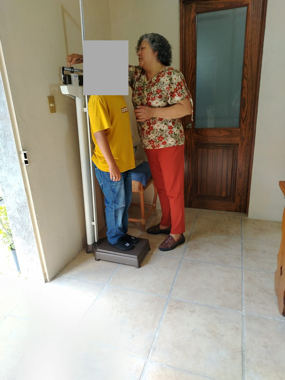 Medical Care: Weight and Height Measurements, with Children's Faces Concealed