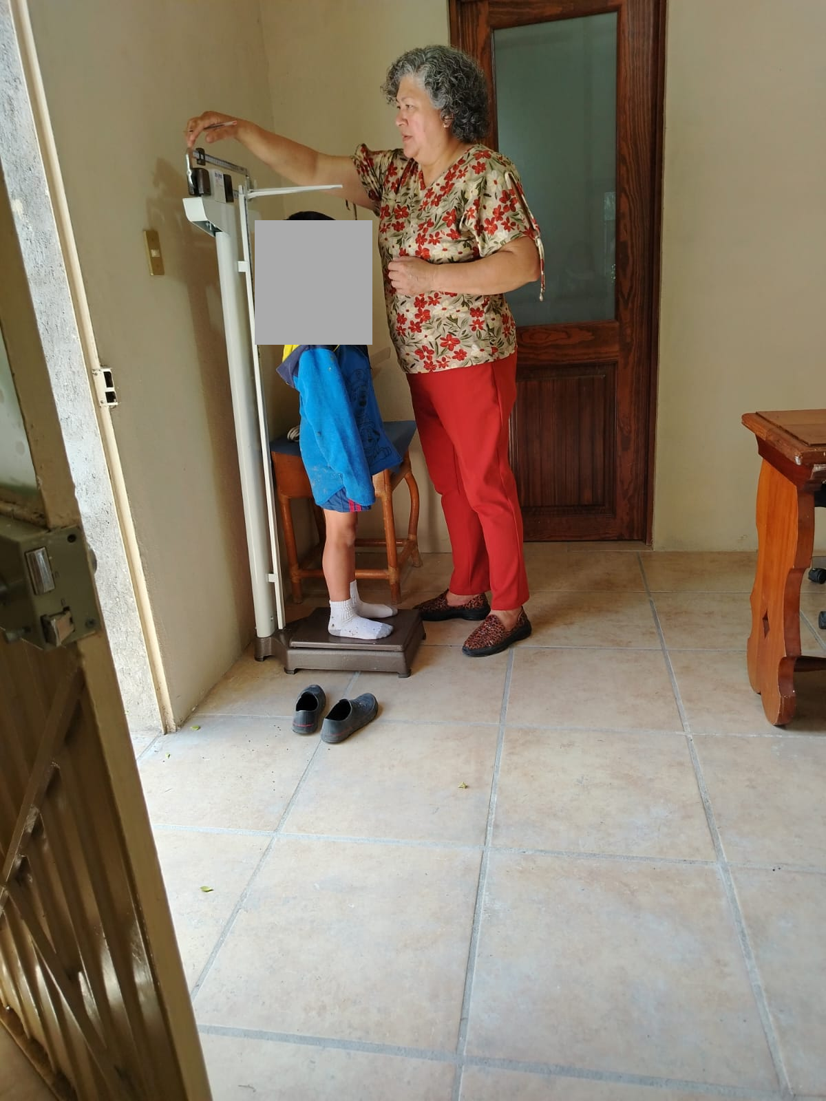 Medical Care: Weight and Height Measurements, with Children's Faces Concealed