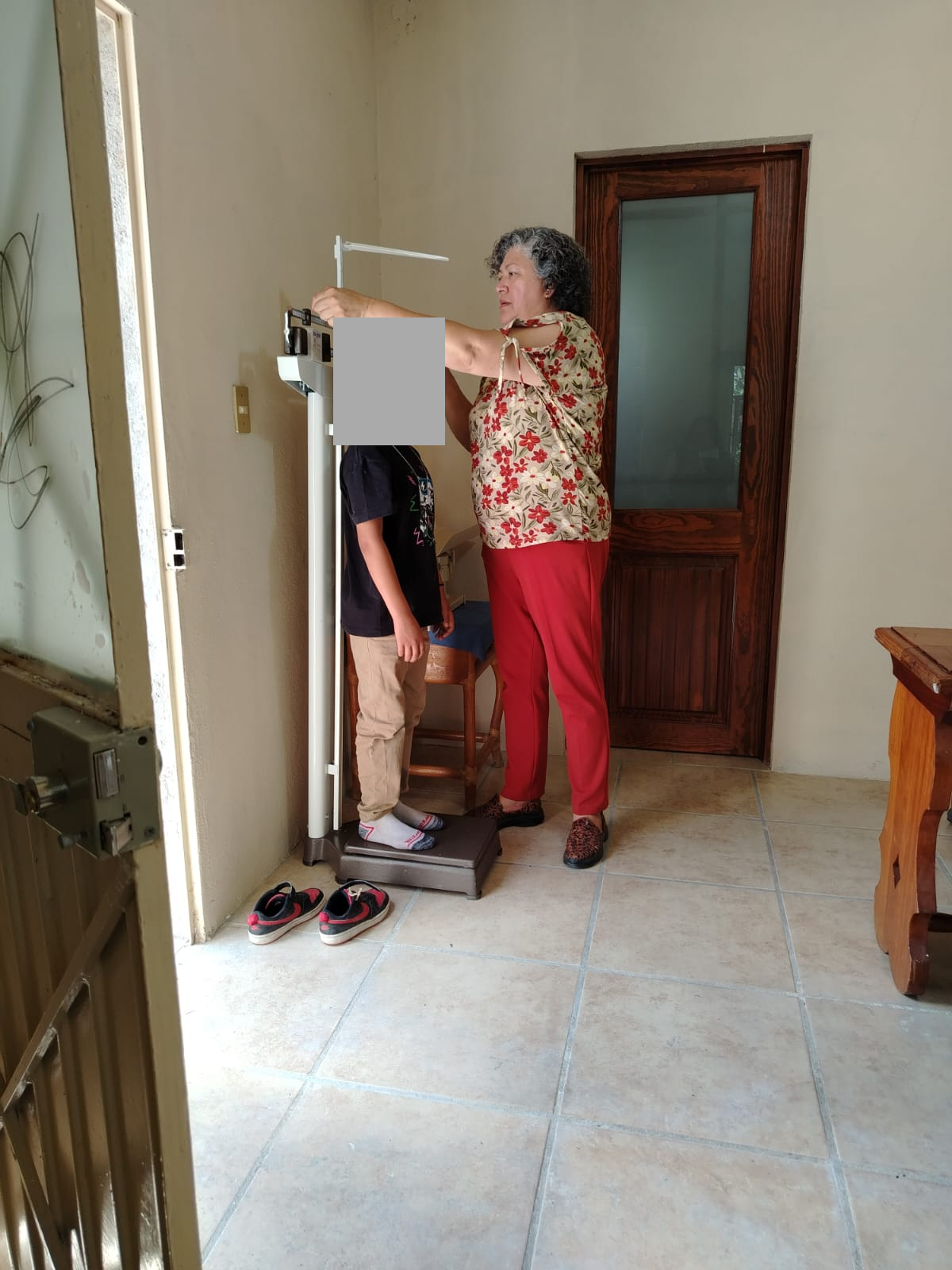 Medical Care: Weight and Height Measurements, with Children's Faces Concealed