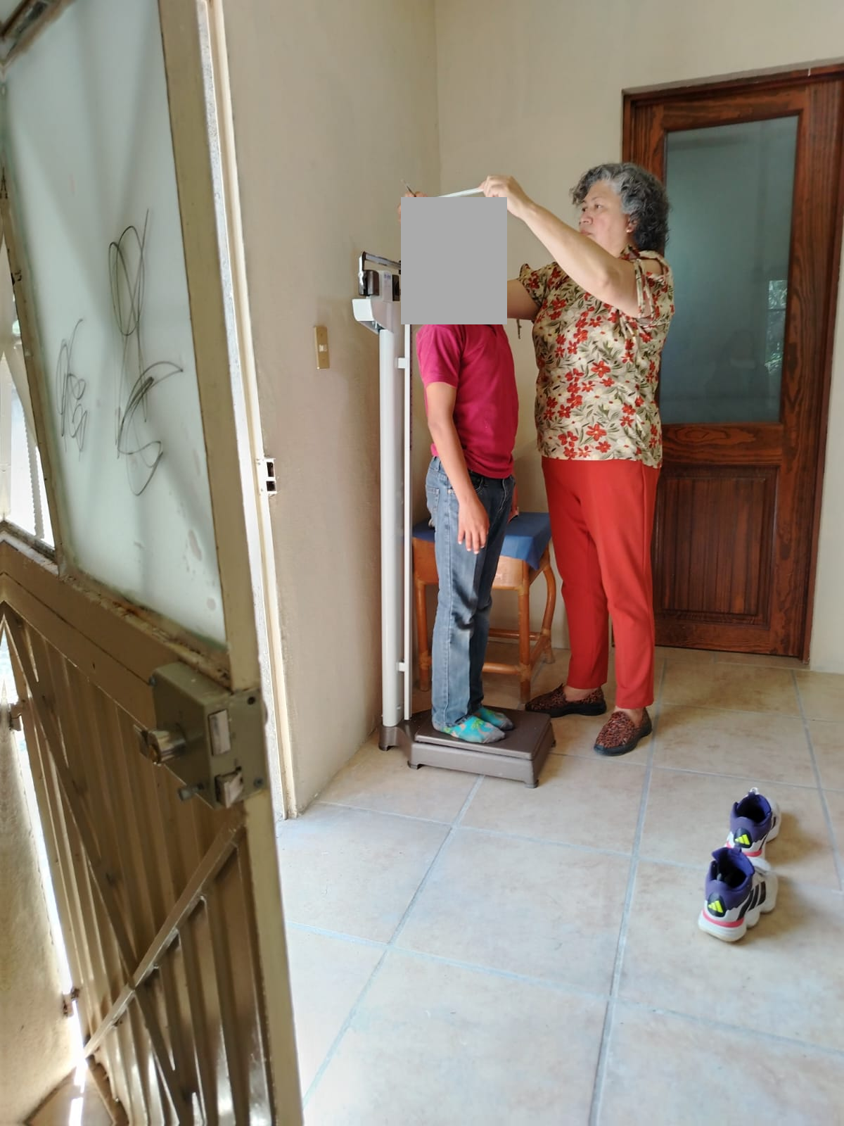 Medical Care: Weight and Height Measurements, with Children's Faces Concealed
