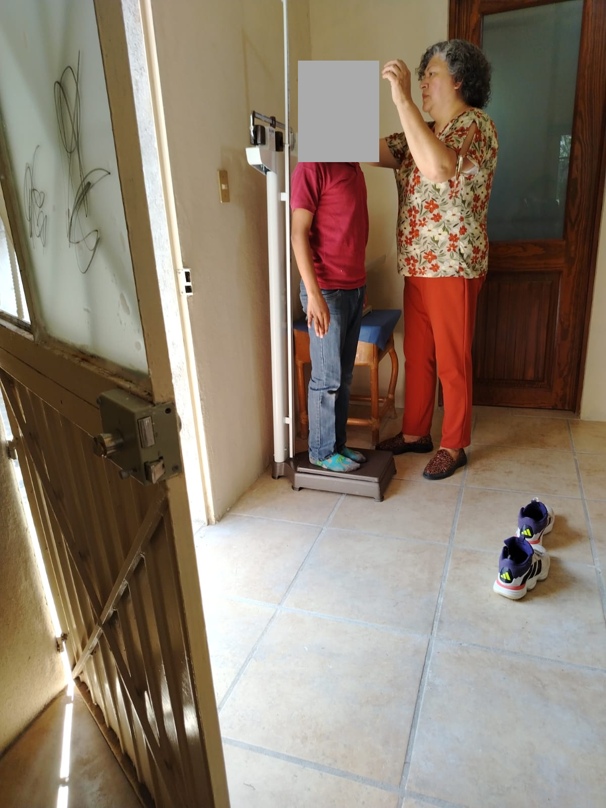 Medical Care: Weight and Height Measurements, with Children's Faces Concealed