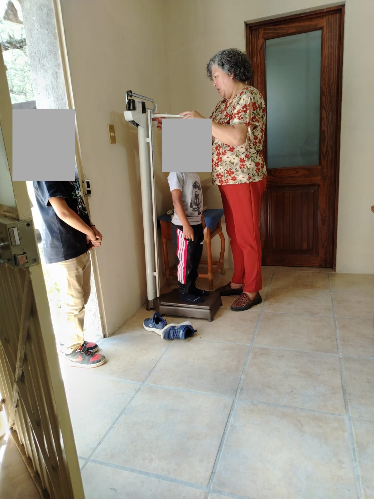 Medical Care: Weight and Height Measurements, with Children's Faces Concealed