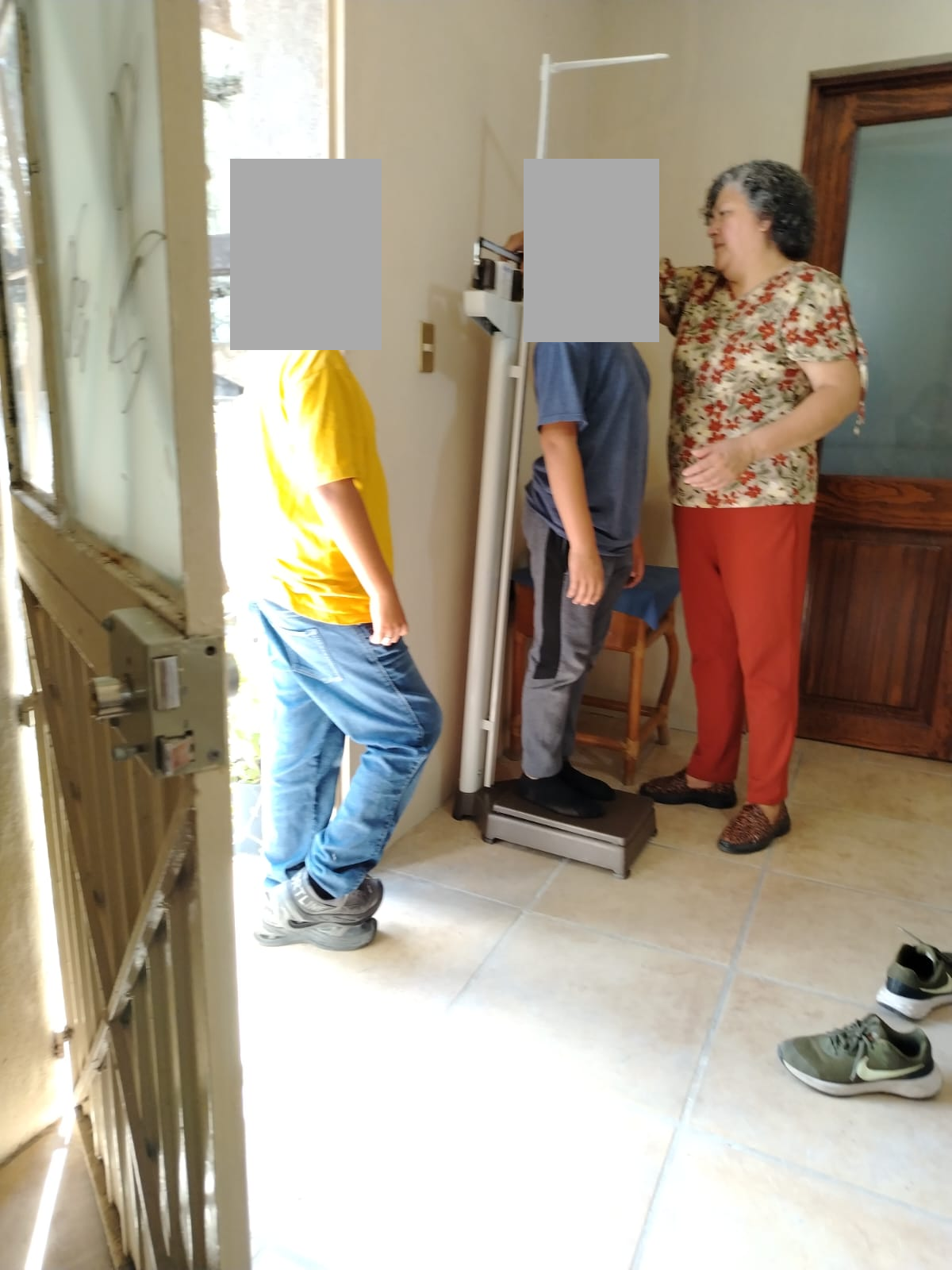 Medical Care: Weight and Height Measurements, with Children's Faces Concealed