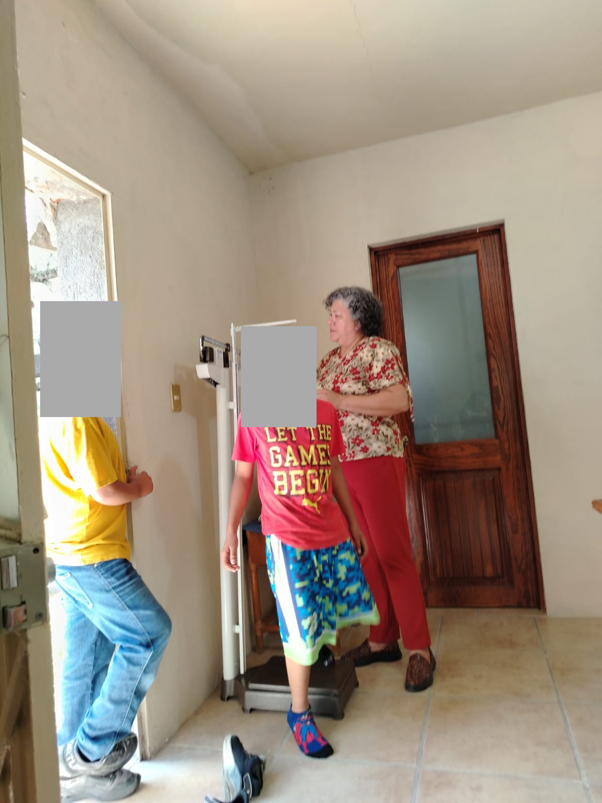 Medical Care: Weight and Height Measurements, with Children's Faces Concealed